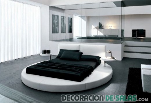 dormitorio con cama redonda moderno